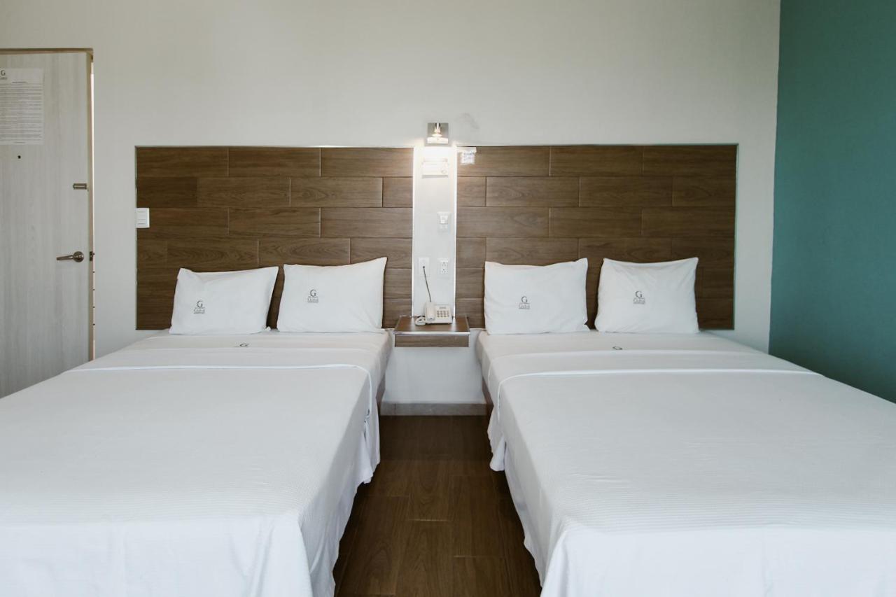 Hotel Guiva Aeropuerto Oaxaca Bagian luar foto